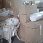 Household furniture and appliances ready for international relocation